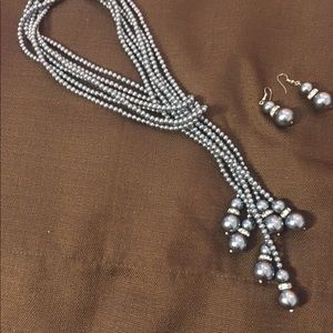 Gray and gold necklaces